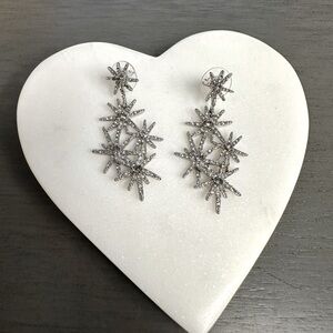 Pave Crystal Star Drop Earrings, dark grey crystals in the center.